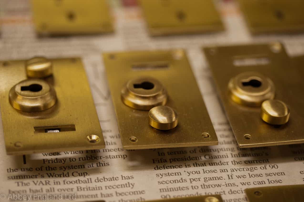 Brass Liston Locks laid on newspaper