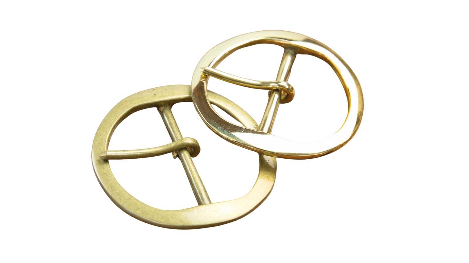 round buckles showing brass and antique finishes